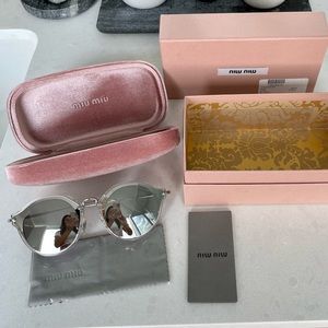 MiuMiu Mirrored Effect Cat Eye Sunglasses